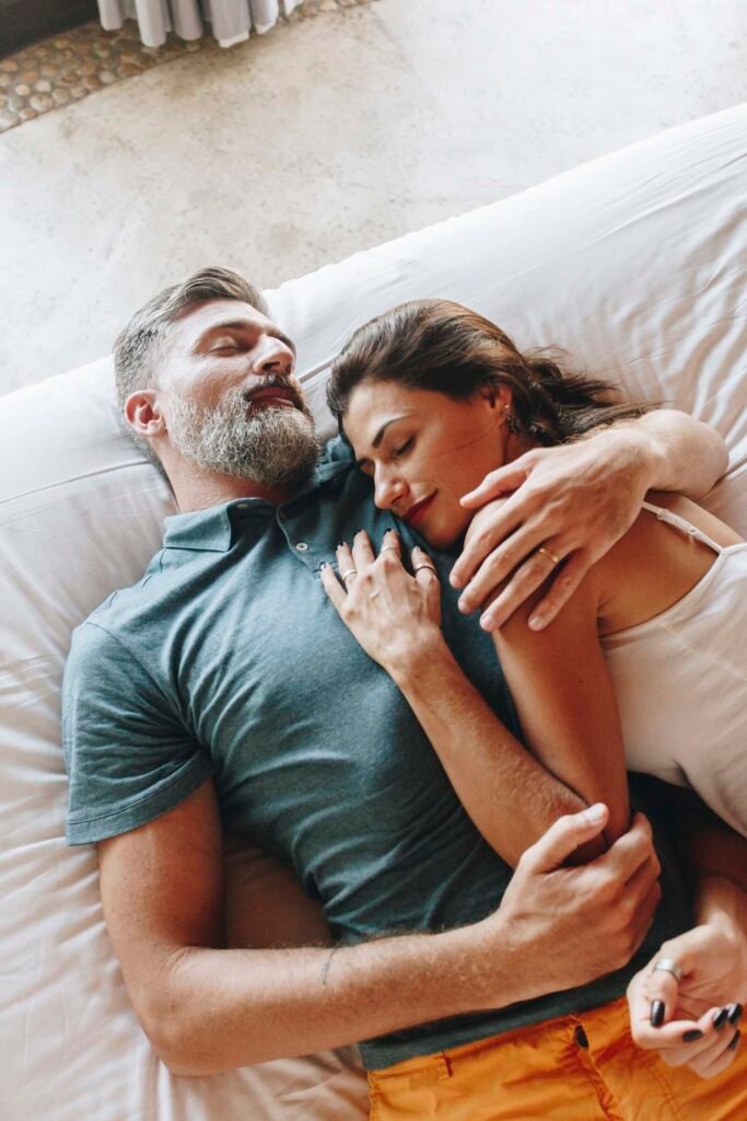 honeymoon couple relaxing in a hotel room l5r8s4x.jpg